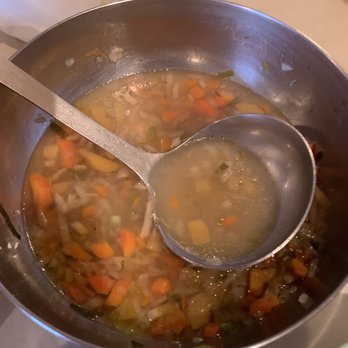 Domaine Labranche - a pot of soup with a spoon in it - Sugar Shacks Near Me - Saint-Isidore-de-Laprairie, Quebec