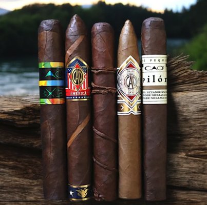 CAO Outpost Volume One - The CAO Outpost Volume One is a striking addition to the CAO brand’s prestigious line of cigars, offering a unique and bold smoking experience. Released as the first in the Outpost Series, this cigar is designed for cigar enthusiasts seeking a full-bodied, adventurous smoke. Drawing inspiration from the untamed and rugged outdoors, the Outpost Volume One blends exotic tobaccos and innovative crafting techniques to provide a truly distinctive experience.
Blend & Flavor Profile
The CAO Outpost Volume One features an intriguing dark and oily Mexican San Andrés wrapper over a blend of Nicaraguan and Honduran tobaccos. The use of aged tobaccos imparts a smooth yet powerful flavor profile, making this cigar an excellent choice for those who appreciate rich and robust cigars.
The cigar delivers a medium-to-full-bodied smoke, with a blend of rich flavors such as:
Dark chocolate and espresso
Spicy pepper and earthy undertones
Toasty oak and leather
Hints of sweet cream and black currant
With each puff, the complexity of flavors shifts and evolves, providing a truly satisfying experience from start to finish.
Construction & Smoking Experience
The CAO Outpost Volume One is a perfectly constructed cigar that boasts impeccable craftsmanship. Offering a 6” x 50 Toro size, the cigar delivers:
An even burn and smooth draw
Generous smoke output
A steady, balanced burn that allows for a slow, deliberate smoking experience
A bold yet creamy finish, with lingering spice and subtle sweetness
Who Should Smoke It?
The CAO Outpost Volume One is ideal for seasoned cigar lovers who enjoy full-bodied, complex cigars with a rich flavor profile and a smooth, satisfying finish. It’s the perfect smoke for those who appreciate cigars with a bold, adventurous spirit and those looking to try something new. It pairs well with dark spirits, such as rum, whiskey, or bourbon, making it a great choice for an evening of relaxation or celebration. CAO Outpost Volume One - The CAO Outpost Volume One is a striking addition to the CAO brand’s prestigious line of cigars, offering a unique and bold smoking experience. Released as the first in the Outpost Series, this cigar is designed for cigar enthusiasts seeking a full-bodied, adventurous smoke. Drawing inspiration from the untamed and rugged outdoors, the Outpost Volume One blends exotic tobaccos and innovative crafting techniques to provide a truly distinctive experience.
Blend & Flavor Profile
The CAO Outpost Volume One features an intriguing dark and oily Mexican San Andrés wrapper over a blend of Nicaraguan and Honduran tobaccos. The use of aged tobaccos imparts a smooth yet powerful flavor profile, making this cigar an excellent choice for those who appreciate rich and robust cigars.
The cigar delivers a medium-to-full-bodied smoke, with a blend of rich flavors such as:
Dark chocolate and espresso
Spicy pepper and earthy undertones
Toasty oak and leather
Hints of sweet cream and black currant
With each puff, the complexity of flavors shifts and evolves, providing a truly satisfying experience from start to finish.
Construction & Smoking Experience
The CAO Outpost Volume One is a perfectly constructed cigar that boasts impeccable craftsmanship. Offering a 6” x 50 Toro size, the cigar delivers:
An even burn and smooth draw
Generous smoke output
A steady, balanced burn that allows for a slow, deliberate smoking experience
A bold yet creamy finish, with lingering spice and subtle sweetness
Who Should Smoke It?
The CAO Outpost Volume One is ideal for seasoned cigar lovers who enjoy full-bodied, complex cigars with a rich flavor profile and a smooth, satisfying finish. It’s the perfect smoke for those who appreciate cigars with a bold, adventurous spirit and those looking to try something new. It pairs well with dark spirits, such as rum, whiskey, or bourbon, making it a great choice for an evening of relaxation or celebration.