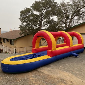 Party Time Rentals - We are coming at you AGAIN with another new waterslide, a brand new Slip-N-Dip! We knew one wasn't enough, this thing is a hit! - Bounce House Rentals Near Me Party Time Rentals - We are coming at you AGAIN with another new waterslide, a brand new Slip-N-Dip! We knew one wasn't enough, this thing is a hit! - Bounce House Rentals Near Me