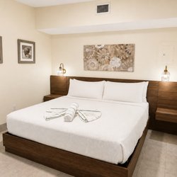 Glunz Ocean Beach Hotel & Resort - Newly renovated Havana Suite with a comfortable king bed, fresh coastal style, and a bright, relaxing feel.