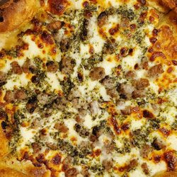 The Flower Shop Winery & Pizzeria - Sausage w/ pesto drizzle