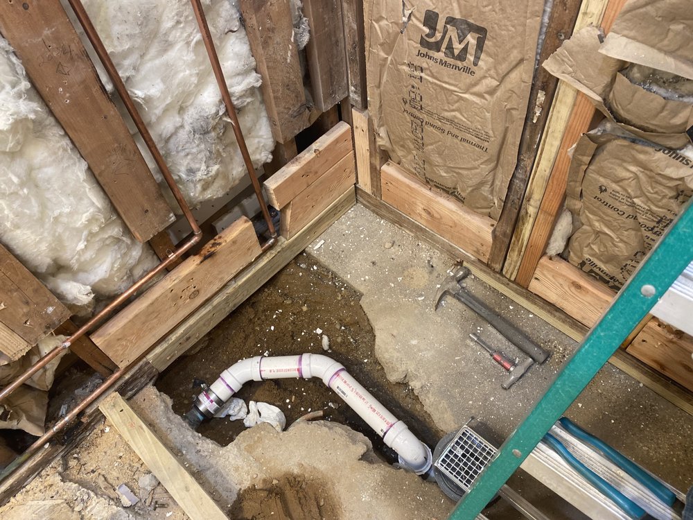 Slide of The in and out plumbing guy