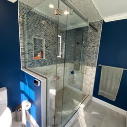 Bill Lizotte Architectural Glass & Aluminum - Hydroslide with Return Set in Clamps and U Channel