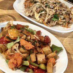 Siamese Restaurant - Front: pad kee mao vegetarian, and pad thai chicken (yummy!)