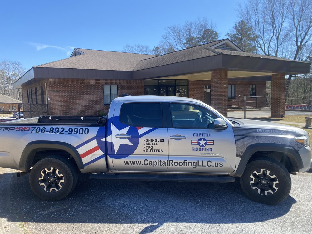 Slide of Capital Roofing