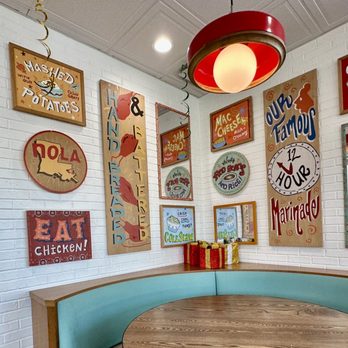 Popeyes Louisiana Kitchen - a table and chairs - Chicken Wings Near Me - Paramus, New Jersey Popeyes Louisiana Kitchen - a table and chairs - Chicken Wings Near Me - Paramus, New Jersey