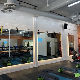 Suspended Mirror installation on concrete block walls with full surround rope lighting Suspended Mirror installation on concrete block walls with full surround rope lighting