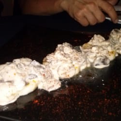 Medallón de merluza con salsa de setas