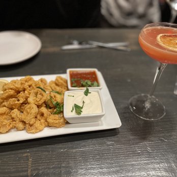 EATaliano Kitchen - Calamari-standard-straight forward. White sauce was very good. Paired with Blood Orange cocktail-NICE! - Italian Near Me - Atlanta, Georgia EATaliano Kitchen - Calamari-standard-straight forward. White sauce was very good. Paired with Blood Orange cocktail-NICE! - Italian Near Me - Atlanta, Georgia