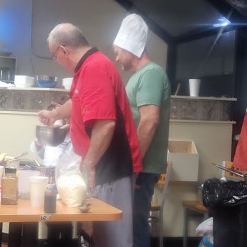 Chef Baba Cooking Class - Going right in using his hands after wiping sweat he did not wash his hands - Cooking Classes Near Me - Lauderdale Lakes, Florida