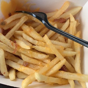 McDonald's - a fork in a container of french fries - Fast Food Near Me - Powder Springs, Georgia McDonald's - a fork in a container of french fries - Fast Food Near Me - Powder Springs, Georgia