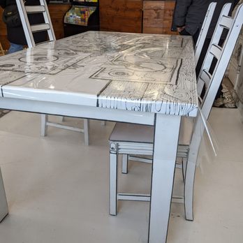 The Ark Cafe - a marble table and chairs - Cafes Near Me - Edmonton, Alberta