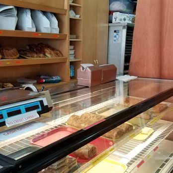 Andre's Hungarian - Already sold out of some items, and the oven is running in the back. It was so incredibly hot in this place. - Bakeries Near Me - Forest Hills, New York Andre's Hungarian - Already sold out of some items, and the oven is running in the back. It was so incredibly hot in this place. - Bakeries Near Me - Forest Hills, New York