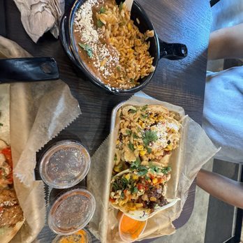 Torchy's Tacos - Side serving (not combo) of rice and beans, chicken fajita, and the hogfather - Tacos Near Me - Orlando, Florida