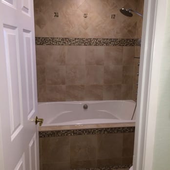 Towne Tile and Stone - a bathtub and shower - Building Supplies Near Me - Beverly Hills, California Towne Tile and Stone - a bathtub and shower - Building Supplies Near Me - Beverly Hills, California