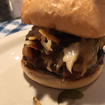 The Wagon Wheel Restaurant - This is the Low Country Burger. It is a taste revelation! Onions, peppers, collard greens, bacon and ghost pepper cheese. Umami heaven!! - Salad Near Me - Deale, Maryland The Wagon Wheel Restaurant - This is the Low Country Burger. It is a taste revelation! Onions, peppers, collard greens, bacon and ghost pepper cheese. Umami heaven!! - Salad Near Me - Deale, Maryland