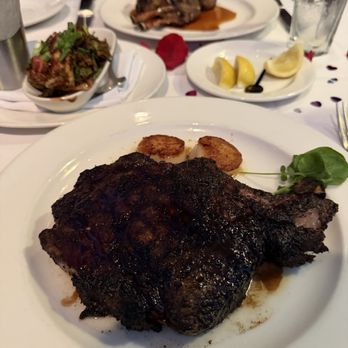 The Capital Grille - Porcini-Rubbed Bone-In Ribeye with 15-Year Aged Balsamic - Steakhouses Near Me - Costa Mesa, California