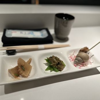 Sushi Ryusei - a plate of sushi and chopsticks - Sushi Bars Near Me - New York, New York Sushi Ryusei - a plate of sushi and chopsticks - Sushi Bars Near Me - New York, New York