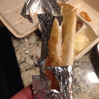 Chipotle Mexican Grill - mmmm...my son's quesadilla with foil wrapped/cooked into it!  What a deal!  Seriously, this Chipotle is laughable... - Mexican Near Me - Shakopee, Minnesota