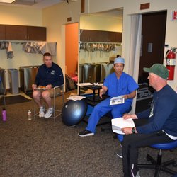 Michael J Huang, MD - Dr. Huang giving a preventative ACL injury talk with the coaches from Pine Creek and our North PT manager Matt Kudron.