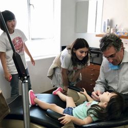 Jeffrey M Cohen, DMD - Dr. Cohen giving our 3 year old an "exam" so she could be like her two sisters and brother.