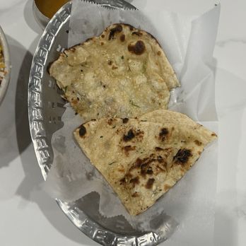Hyderabad House - Garlic Naan (you get 4 pieces...we were just hungry before I realized I needed to take pix. - Indian Near Me - Hoover, Alabama Hyderabad House - Garlic Naan (you get 4 pieces...we were just hungry before I realized I needed to take pix. - Indian Near Me - Hoover, Alabama
