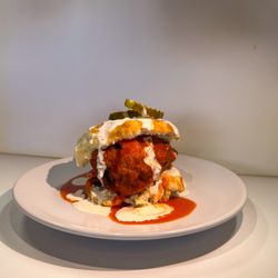Rons Goode BBQ and Catering - The Buffalo Chicken Biscuit with chicken tossed in buffalo sauce topped with ranch and pickles.