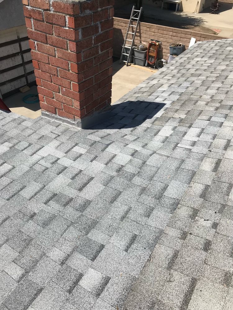 Slide of Mencho's Roofing & Repairs