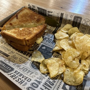 Tap-N-Pour - a grilled cheese sandwich and chips - Wine Bars Near Me - Cuba, New York Tap-N-Pour - a grilled cheese sandwich and chips - Wine Bars Near Me - Cuba, New York