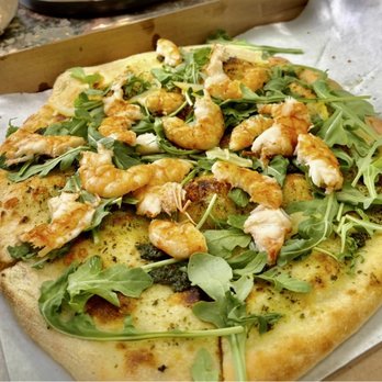 Kitoko Maui - Kauai shrimp pizza from Blue Door Bread and Pizza. Light and crispy crust with nice chew. Love the lemon rind garnishes. - Food Trucks Near Me - Kihei, Hawaii
