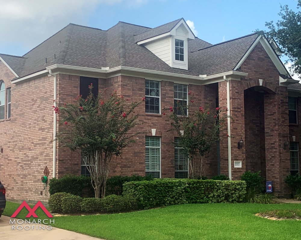 Slide of Monarch Roofing