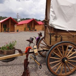 East Zion-Glendale Ranch Cabins - T Lazy 7 Ranch Cabins. We have a big parking lot to park in. An  Amish Covered wagon and Tin Sheriffs to protect the settlers.