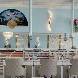 ABT Nails and Spa - Seating for having your fingernails done and also showing good variety of colors to choose from.