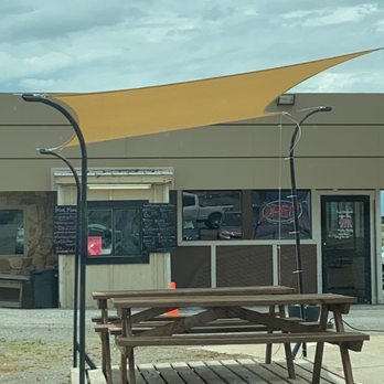 Pink Elephant Coffee and Snowcones - a picnic table and bench - Shaved Ice Near Me - Elgin, Oklahoma Pink Elephant Coffee and Snowcones - a picnic table and bench - Shaved Ice Near Me - Elgin, Oklahoma
