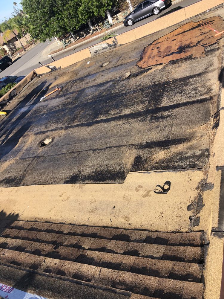 Slide of Escamilla’s Roofing and Rain Gutters