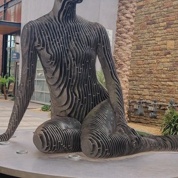 Juniper Table - View of Sculpture from outdoor patio - New American Near Me - Palm Springs, California