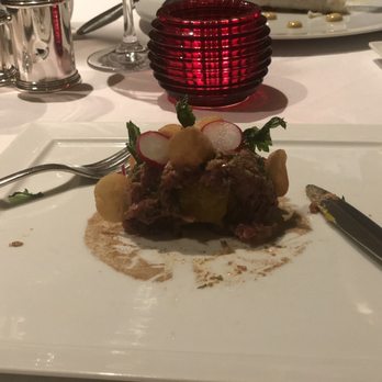 Maison Blanche - Delicious steak tartar with a lightly cooked, delicate yolk inside - French Near Me - Longboat Key, Florida