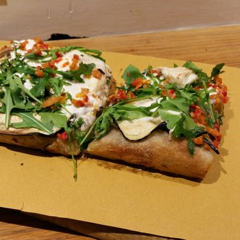 Romana Pizzeria al Taglio - Slice of pizza with thick crust (very tasty and crispy) zucchini, burrata, chili and arugula - Pizza Near Me - Rome, RM Romana Pizzeria al Taglio - Slice of pizza with thick crust (very tasty and crispy) zucchini, burrata, chili and arugula - Pizza Near Me - Rome, RM