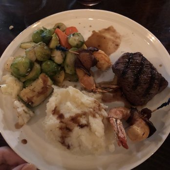 Peter Christian's Tavern - Petit filets (one filet eaten already) - American Near Me - New London, New Hampshire Peter Christian's Tavern - Petit filets (one filet eaten already) - American Near Me - New London, New Hampshire