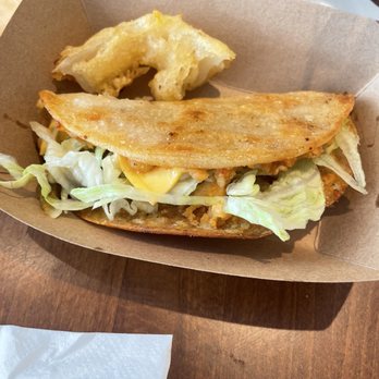 Fish Company Taco - Baja and Captain Johnny tacos. Delicious! Not much left of that awesome onion ring! - Tacos Near Me - Galveston, Texas Fish Company Taco - Baja and Captain Johnny tacos. Delicious! Not much left of that awesome onion ring! - Tacos Near Me - Galveston, Texas