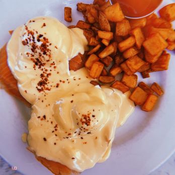 Hank's - SALMON BENEDICT poached eggs*, lox, english muffin, hollandaise, breakfast potatoes - Coffee & Tea Near Me - Austin, Texas Hank's - SALMON BENEDICT poached eggs*, lox, english muffin, hollandaise, breakfast potatoes - Coffee & Tea Near Me - Austin, Texas
