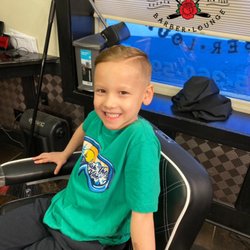 Blake's Barber Lounge - 1 fade with a hard part and under cut