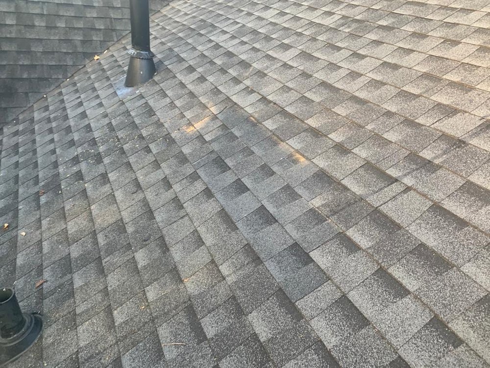 Slide of Rosie's Roofing and Restoration