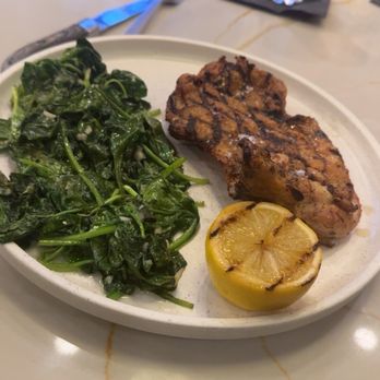 Novecento - Grilled chicken thigh and sautéed spinach - Argentine Near Me - Delray Beach, Florida