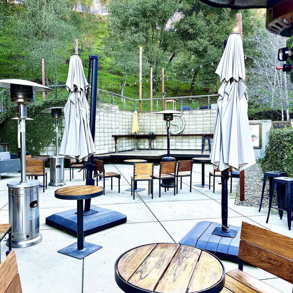 Shale Oak Winery - Back patio area with an upper deck over the stage for club guests. - Wineries Near Me - Paso Robles, California Shale Oak Winery - Back patio area with an upper deck over the stage for club guests. - Wineries Near Me - Paso Robles, California