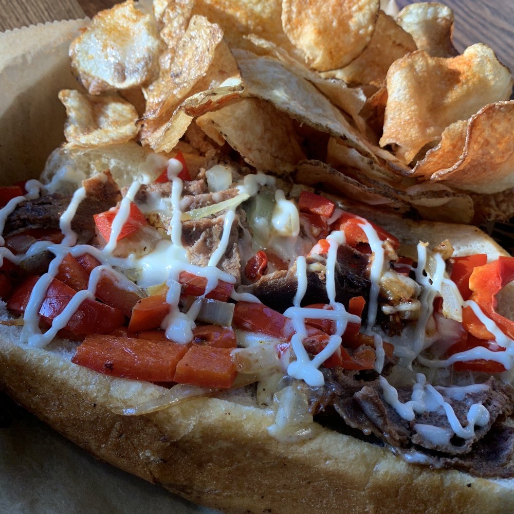 East Coast Wings + Grill - Steak Philly with house chips - American Near Me - Thomasville, North Carolina