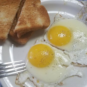 T A's Place - two fried eggs and toast on a plate - Restaurants Near Me - Walton, New York T A's Place - two fried eggs and toast on a plate - Restaurants Near Me - Walton, New York