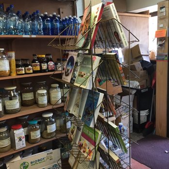 Blue Nile Botanicals - a display of products in a store - Herbs & Spices Near Me - Washington, DC, District of Columbia