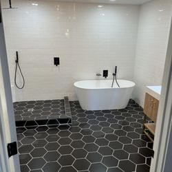 Vargas the Solver - complete restoration of bathroom new tile new tub new lights window relocated