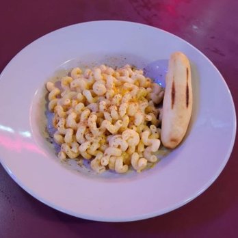 Duffy's Bar & Grill - Homemade Mac and Cheese with a garlic breadstick at Duffy's Bar & Grill is one that you NEED to try. Visit us today! - Bars Near Me - Osseo, Minnesota